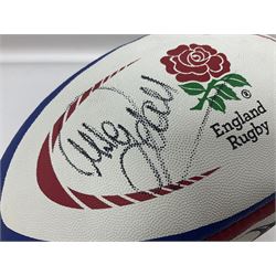 England Rugby official replica ball by Gilbert signed by Mike Tindall, together with a FIFA football