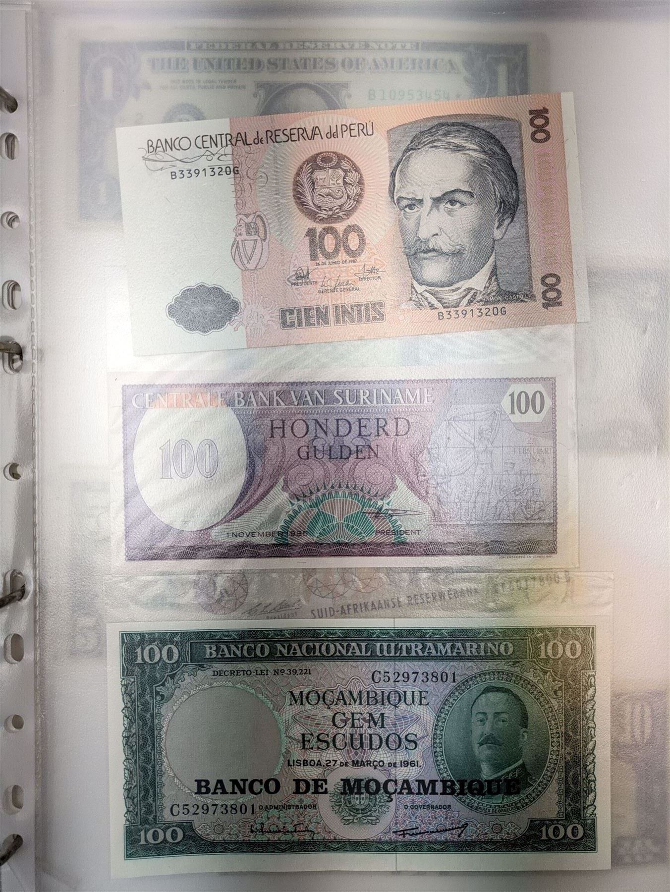 Great British and World banknotes, including two Bank of England Gill five pounds 'SA79432020' and 'SA79432021' various Somerset one pounds etc, Reserve Bank of New Zealand fifty dollars, various The States of Jersey one pounds, Singapore ten dollars etc, housed in a ring binder folder