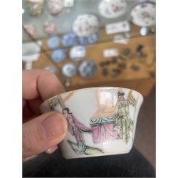 Group of eight 18th century and later Chinese famille rose and similar painted teabowls and dishes, to include unmarked peony cup, small cup decorated with flowers and butterfly, cup decorated with female figure gazing out of a window in a Buddhist temple with indistinct square character mark to base, pair of saucers unmarked, and others with character scenes unmarked (8)
