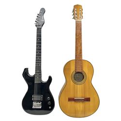 Encore black electric cut-away guitar L96cm; and Spanish Victor Garcia model 187 acoustic guitar, bears label dated 1972 L99cm; each in soft carrying case (2)