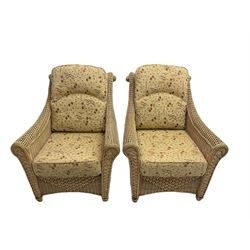 Four piece cane conservatory suite - two seat sofa (W130cm), pair of armchairs (W85cm), and coffee table (85cm x 60cm)