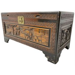 20th century carved camphor wood chest, rectangular hinged top enclosing removable tray and compartment, carved all-over with traditional pagoda scenes with figures