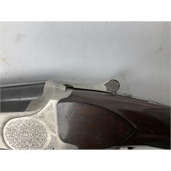 Winchester Japan 5500 12-bore by two-and-three quarters over-and-under double barrel boxlock ejector sporting gun, with 71cm barrels, ventilated rib and barrels, the walnut stock with chequered pistol grip and fore-end, single selective trigger and top safety, serial no.K542927E, L115cm overall; in gun sling SHOTGUN CERTIFICATE REQUIRED