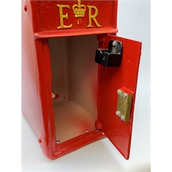 A large reproduction red painted cast metal post box, H59.5cm. 