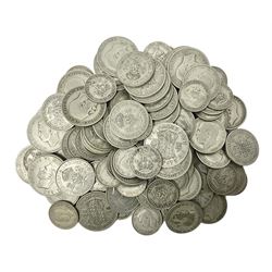 Approximately 1050 grams of Great British pre 1947 silver coins, including one shillings, florins halfcrowns etc