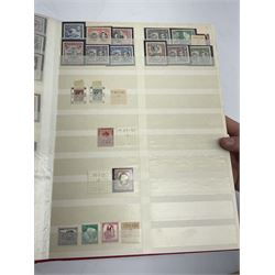 British Empire and Commonwealth stamps including Aden, Antigua, Bahamas, Barbados, Bermuda, Ceylon, Falkland Islands Dependencies, Gambia, Grenada, East Africa and Uganda Protectorates, Malta, Gibraltar Morocco Agencies overprints, Nigeria, St Helena, St Kitts Nevis, St Vincent, Sarawak, Sierra Leone etc, mostly mounted mint, housed in a red stockbook
