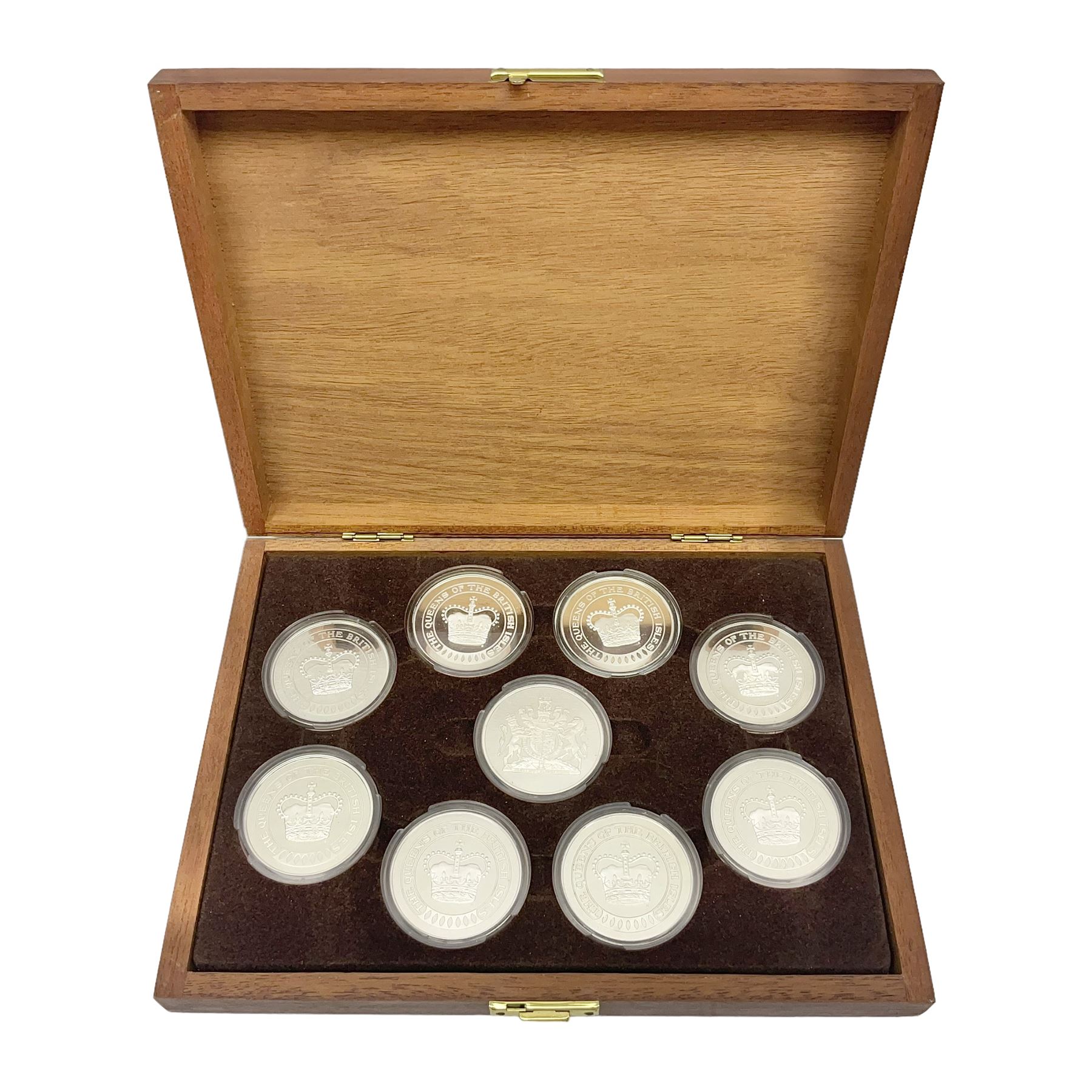 The Birmingham Mint 'The Queens Of The British Isles' sterling silver hallmarked nine medal set, housed in a fitted case, overall combined weight of the medals approximately 400 grams
