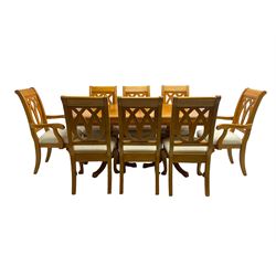 Yew wood extending twin pedestal dining table, rectangular top with ebony stringing over turned and reeded vasiform pedestals on tripod bases, with two additional leaves (W159cm D92cm); and set of eight (6+2) matching dining chairs, high pierced backs over seats upholstered in ivory fabric, on cabriole supports (W57cm H101cm)