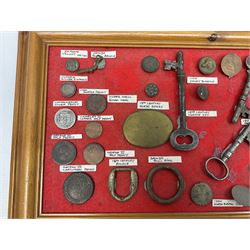 Collection of metal detecting finds and antiquities, housed on five display boards and some loose, to include coins, keys, axe head etc 