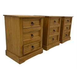 Pair of pine three drawer bedside chests, black iron handles