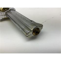 Early 20th century Flobert 5mm blank firing revolver with six-shot chamber, top venting, nickel plated with folding trigger No.118 L12.5cm overall; replica non-firing 'British Bulldog' revolver; and Windproof gas lighter inscribed 'Revolver-99 Spring and Autumn' in holster marked 'Star-Line'