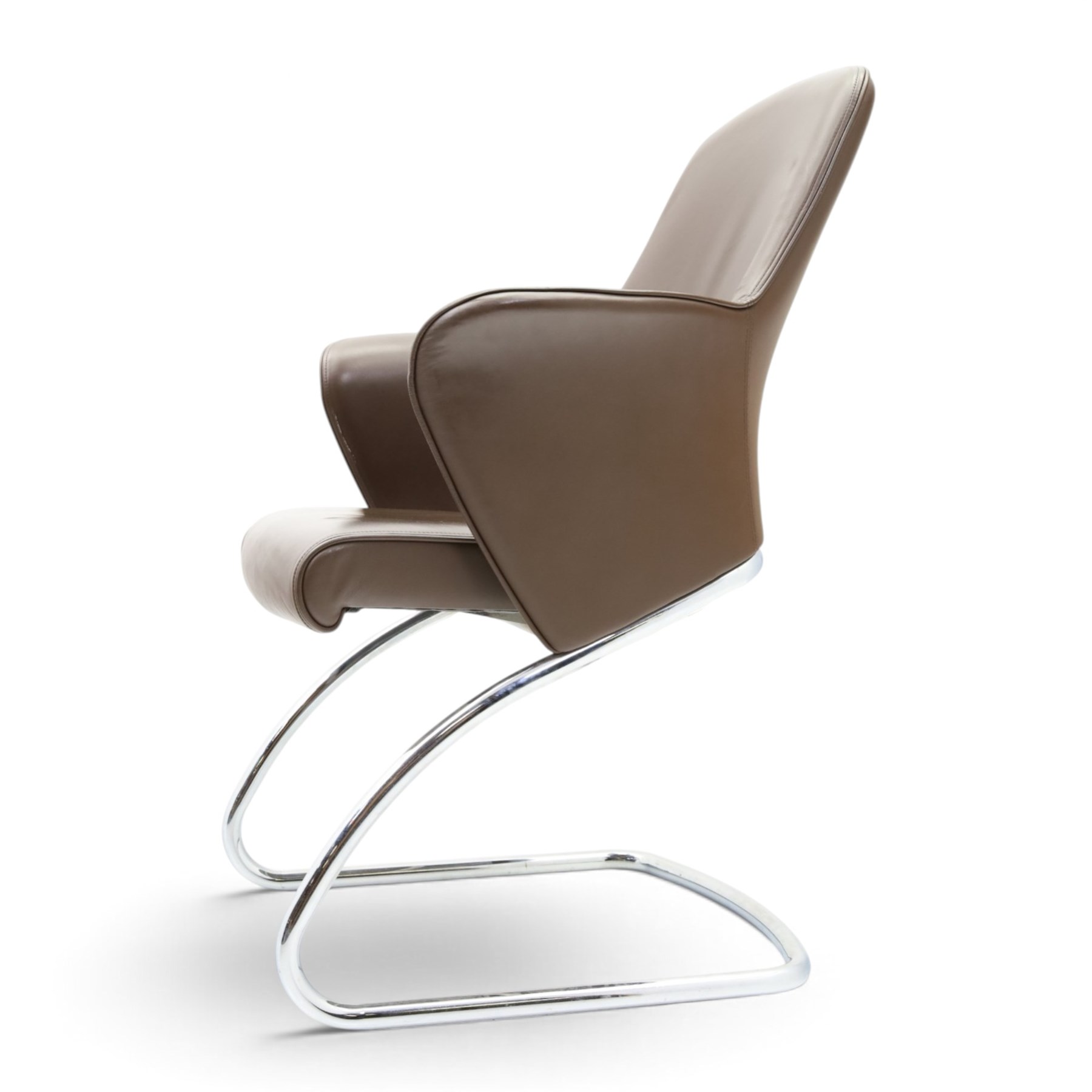 Set of four contemporary Senator executive cantilever chairs, upholstered in Padova hide, moulded back and integrated armrests, raised on a tubular chromed cantilever base