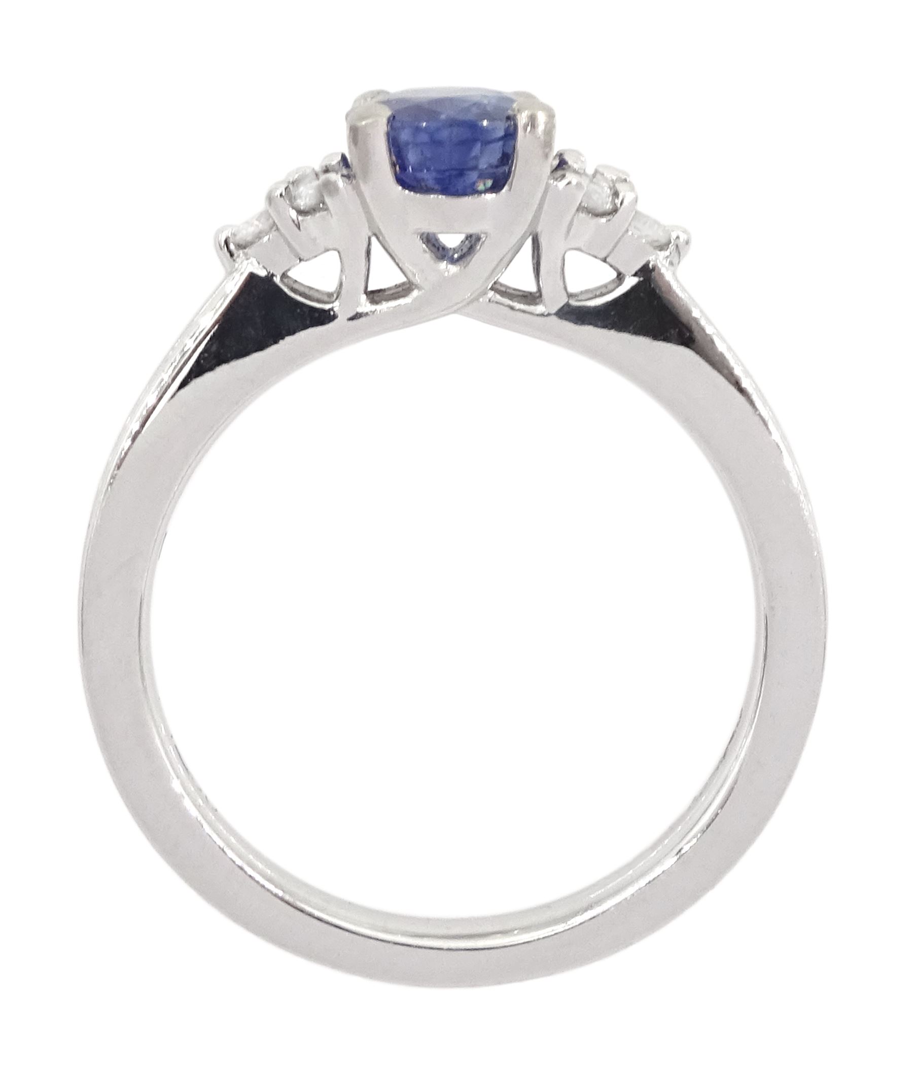 Platinum oval cut sapphire and six stone round brilliant cut diamond ring, hallmarked, sapphire approx 0.90 carat
