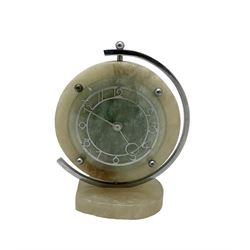 English 1920's Art Deco white-onyx mantel clock c1920, with a circular marble surround,  glass fronted chrome plated chapter with fretted Arabic numerals and conforming hands, movement and dial suspended in a semi-circular swivel gimbal mount, spring driven movement with a balance escapement, wound and set from the rear.