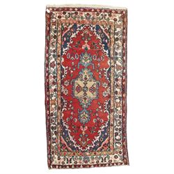 Small Persian crimson ground Hamadan rug, decorated with central medallion surrounded by s...
