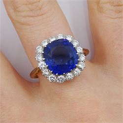18ct gold cushion cut unheated sapphire and diamond cluster ring, the sapphire measuring approx 10.3mm x 9.5mm depth approx 5.5mm