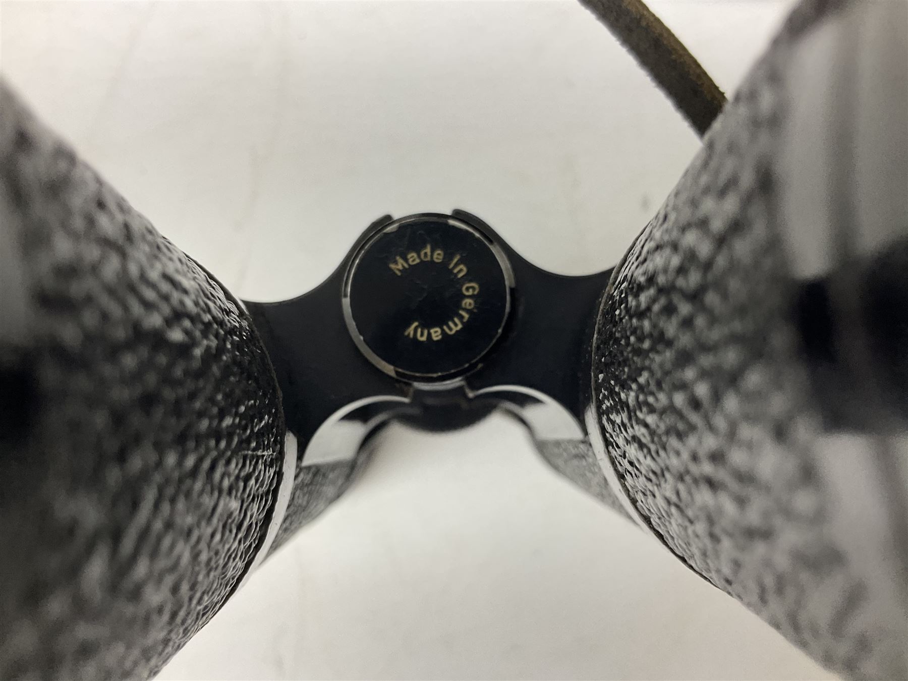 Eleven pairs of binoculars, to include Zeiss Wetzler 20x50, Taylor-Hobson Bino Prism No.2 Mk.III military stamped 1943 with broad arrow,  Swift Tecnar 16x50, J.T Coppock Oceanic Bloomed 10x50, Hensoldt Wetzlar Dialyt 7x42 etc