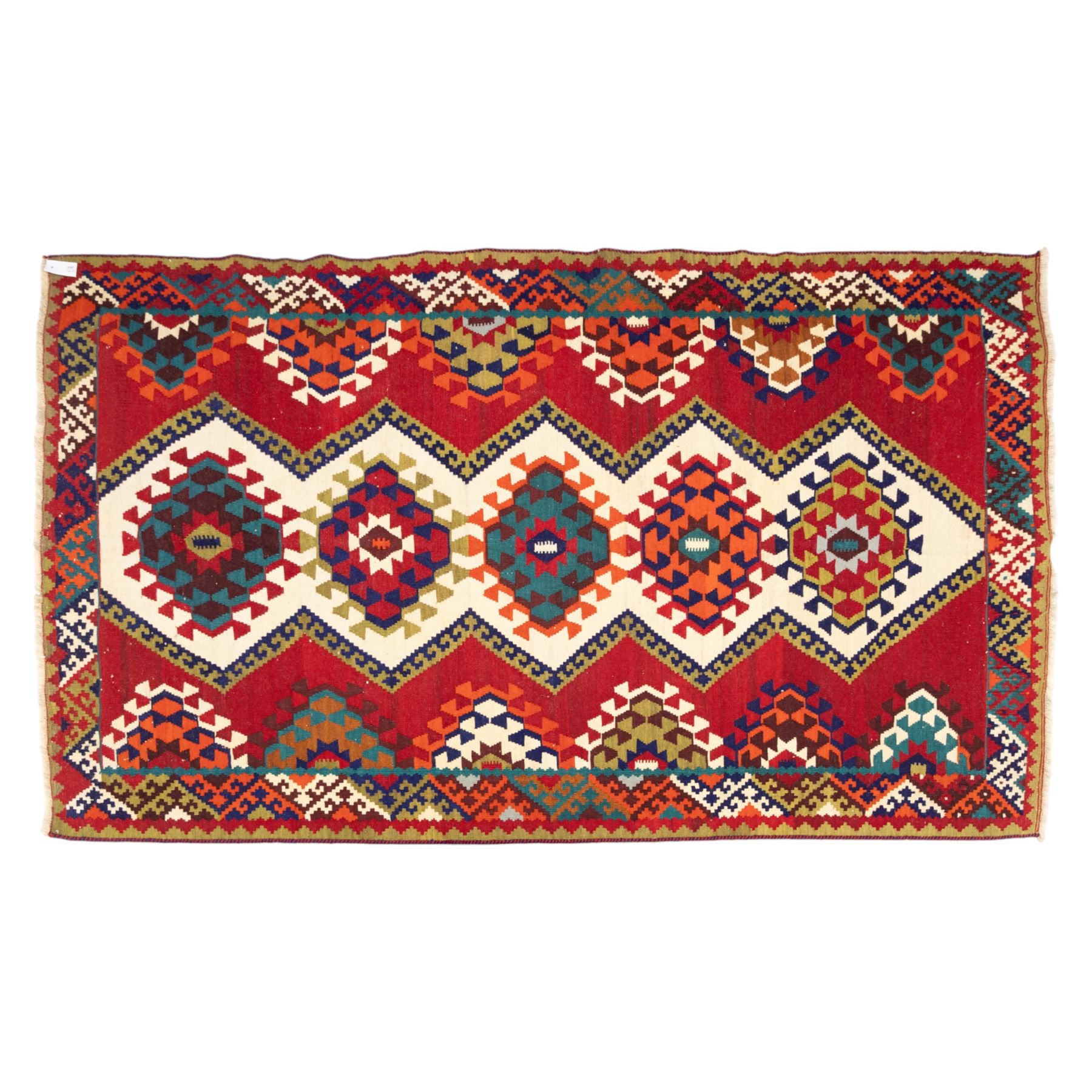 South west Persian Qashqai flatweave kilim, central field with a linked column of hooked diamond medallions in polychrome tones with an ivory lattice on a magenta ground framed by multiple geometric borders 