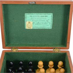 Jaques 'The Staunton Chess-Men' boxwood and ebony chess set, in original brass mounted mahogany box with paper label to interior, only the boxwood king stamped Jaques London, some pieces marked with red crown, boxwood king H11cm