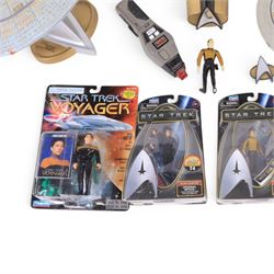 Four carded Playmates Star Trek figures, comprising Ensign Harry Kim, Galaxy Collection Kirk, Original Spock and Spock, together with a small collection of loose Star Trek models and star ships