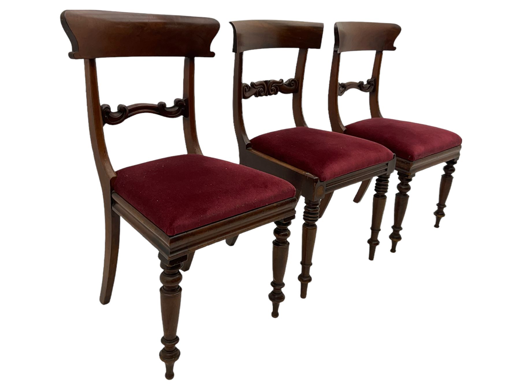 Seven early 19th century mahogany dining chairs - set six side chairs with scroll carved middle rails (W46cm), and a carver elbow chair with rope twist middle rail