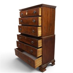 George III mahogany chest on chest, moulded cornice over two short over two long drawers with figured mahogany veneers, lower section fitted with three further long drawers, oval brass plate handles and escutcheons, on shaped bracket feet