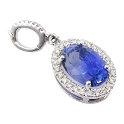 18ct white gold oval Ceylon sapphire and diamond pendant, stamped 750, sapphire approx 7.20 carat