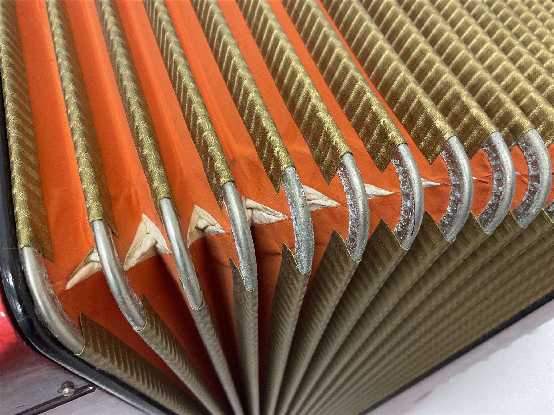 German Hohner student II compact accordion with 26 keys and 12 bass registers in a hard case With tutor