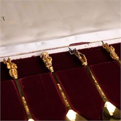 Set of twelve 'The Tichborne Collection' silver gilt spoons, each with fig shaped bowls, the finials depicting different historical figures including Queen Elizabeth, Hector of Troy and Saint Peter, hallmarked Birmingham Mint 1978, in fitted case