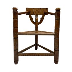 Pair of 18th century design oak turner chairs, the rectangular back incised with geometric decoration, triangular panelled seat, on turned supports