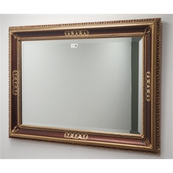  Rectangular bevel edge wall mirror in two tone gilt swept frame (93cm x 68cm), and another rectangular bevel edge wall mirror in gilt frame (35cm x 95cm)  
