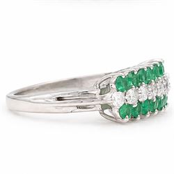 18ct white gold three row diamond and emerald ring, set with eight round brilliant cut diamonds and a row of seven emeralds set either side, total diamond weight approx 0.30 carat