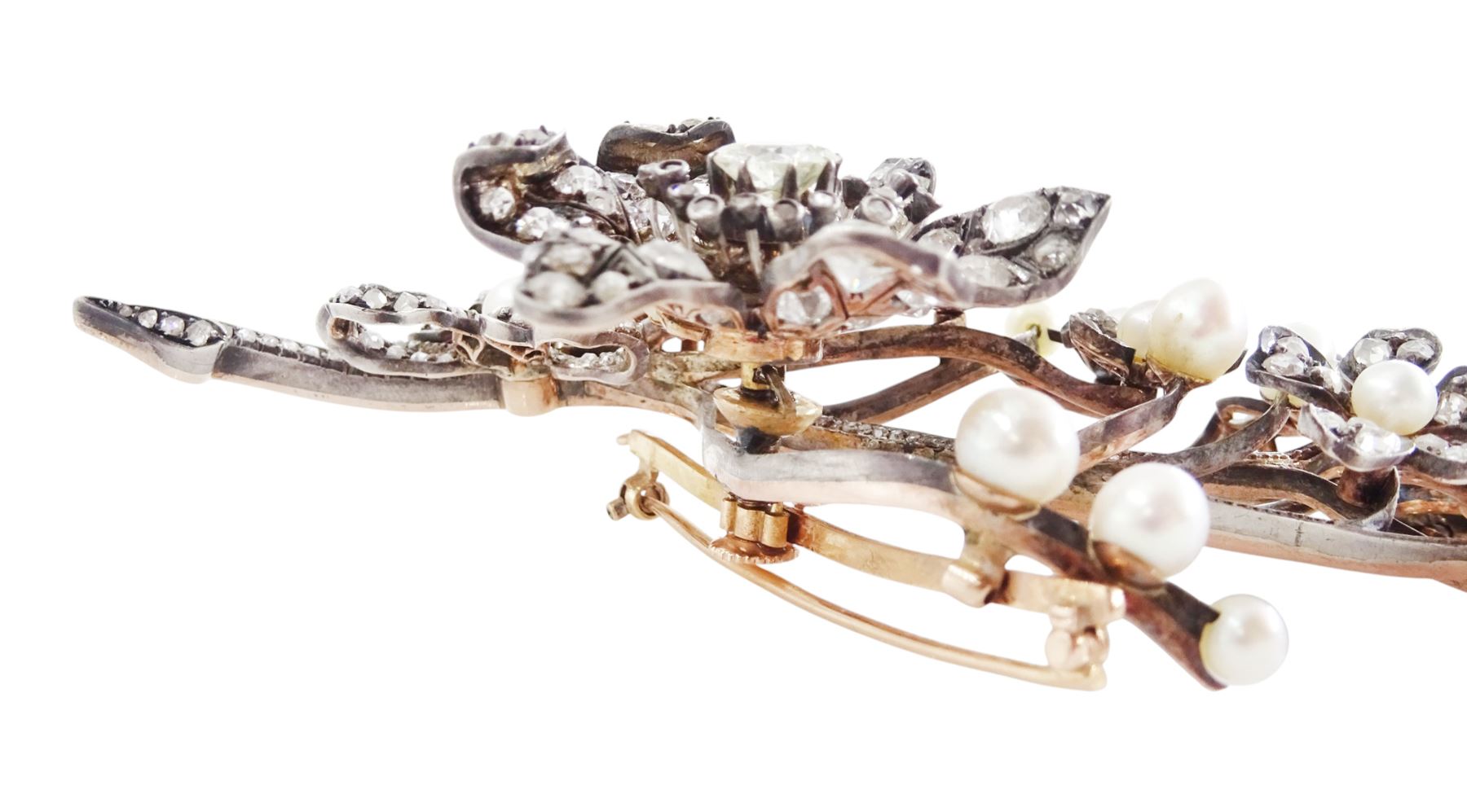 19th century gold and silver diamond and pearl en tremblant detachable brooch, the flower tremblant with a principal old cut diamond of approx 1.90 carat, the petals and stamen set with old cut and rose cut diamonds, total diamond weight approx 9.10 carat, to a foliate spray set set with further rose cut diamond and white / pink / cream pearls and ribbon tie