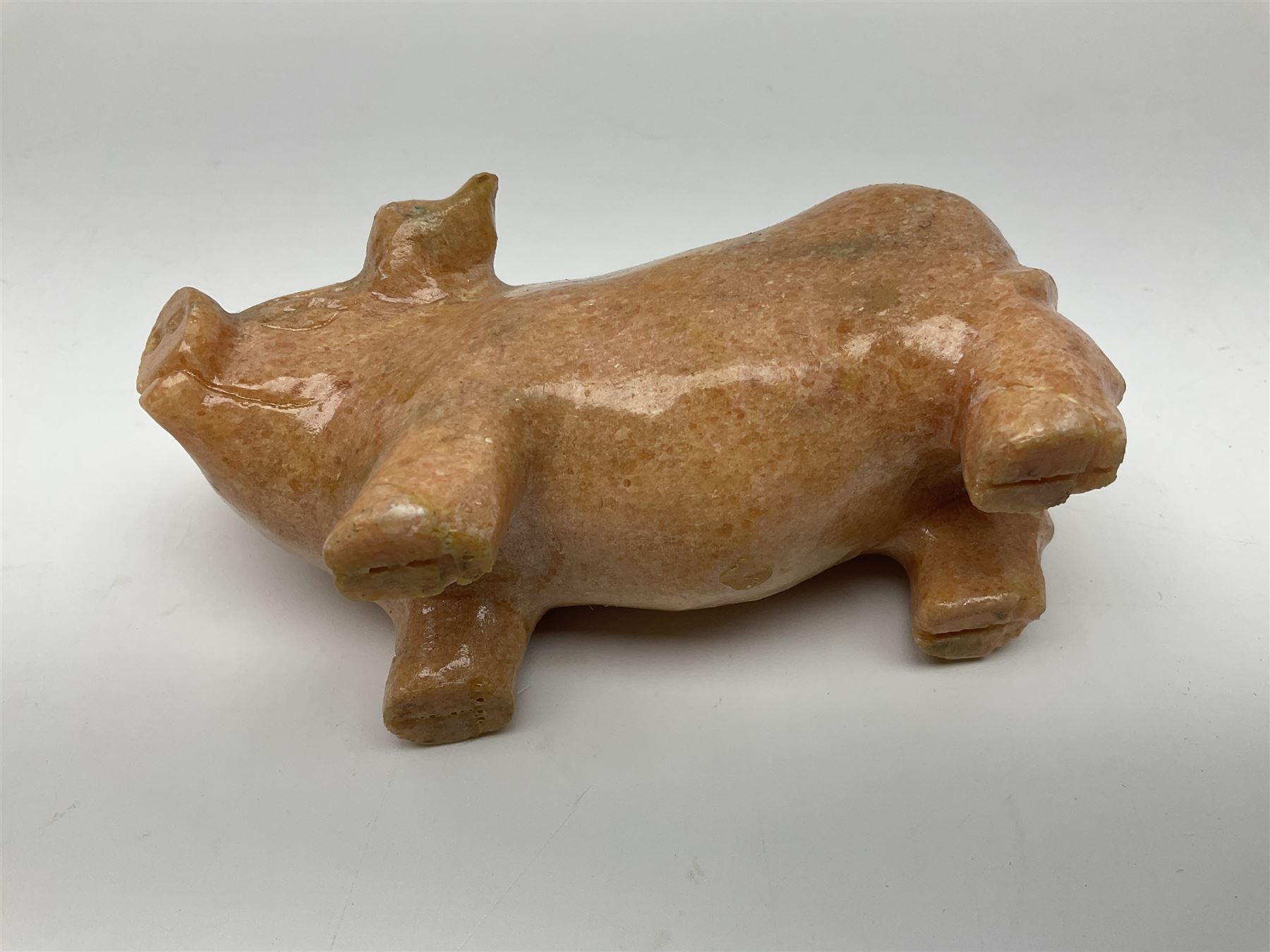 Carved calcite figure in the form of a pig, H6cm
