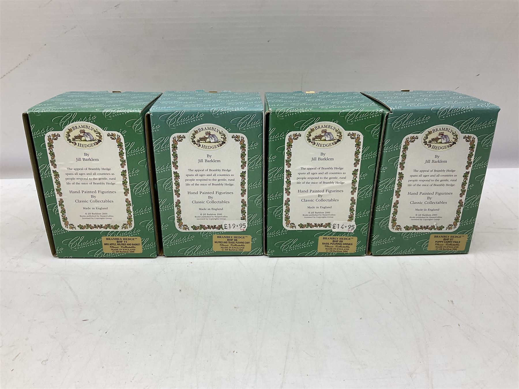 Four Classic Collectables Brambly Hedge figures, comprising Basil Pouring Drinks, Wilfred and Teasel Pushing Cart, Poppy Carry Pails and Mrs Apple, Wilfred and Basket, all boxed
