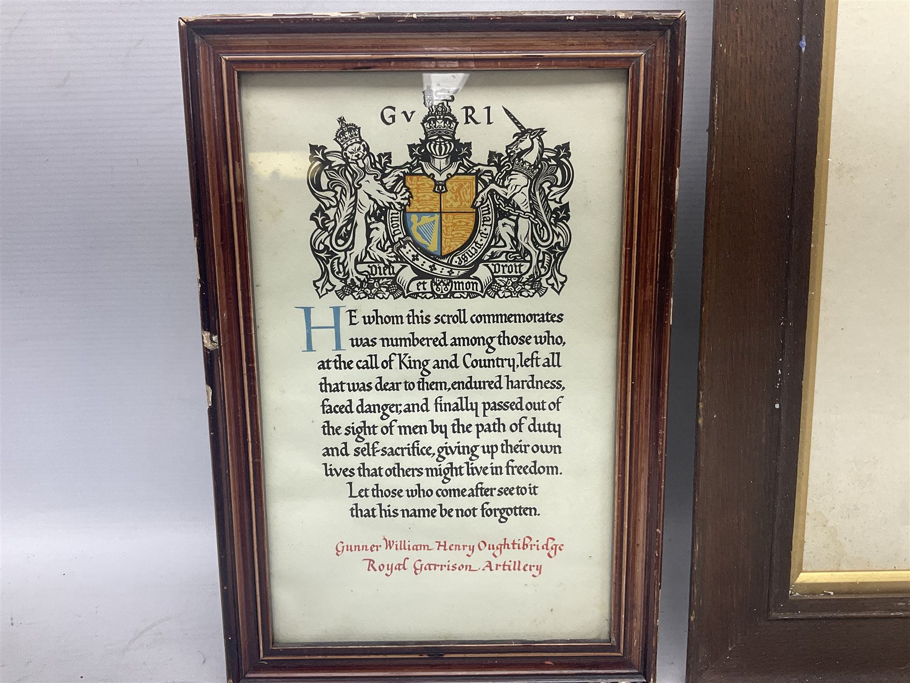 George V WW1 Memorial Scroll to Gunner William Henry Oughtibridge Royal Garrison Artillery; and WW1 Lincolnshire Regiment Disabled Honourable Discharge certificate with indistinct faded inscription; both framed (2)