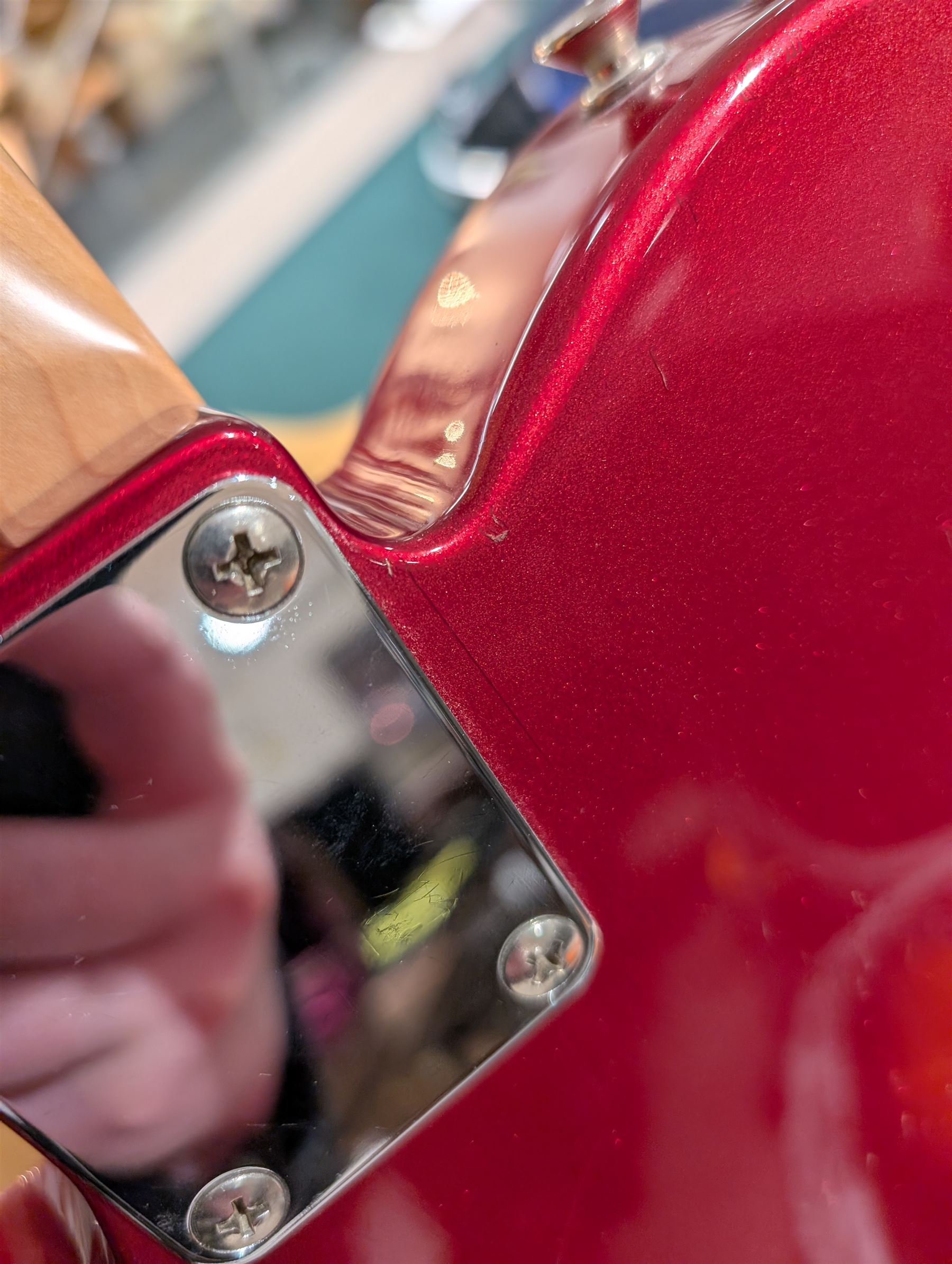 Fender Telecaster electric guitar, serial no. T021384 made in Japan c.1994, with Candy Apple Red body, white scratch plate and maple neck, guitar L98cm