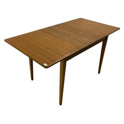 Gordon Russell - mid century walnut and teak extending dining table, with leaf, and four chairs upholstered in embossed vinyl 