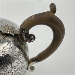 Late Victorian silver bachelors three piece tea service, comprising bullet shaped teapot, open sucrier and milk jug, each engraved with monogram surrounded by birds upon and amidst a blossoming vine, the teapot with scroll capped curved wooden handle and wooden finial to cover, hallmarked Wakely & Wheeler, London 1890, teapot including handle H12cm, sucrier H5.5cm 