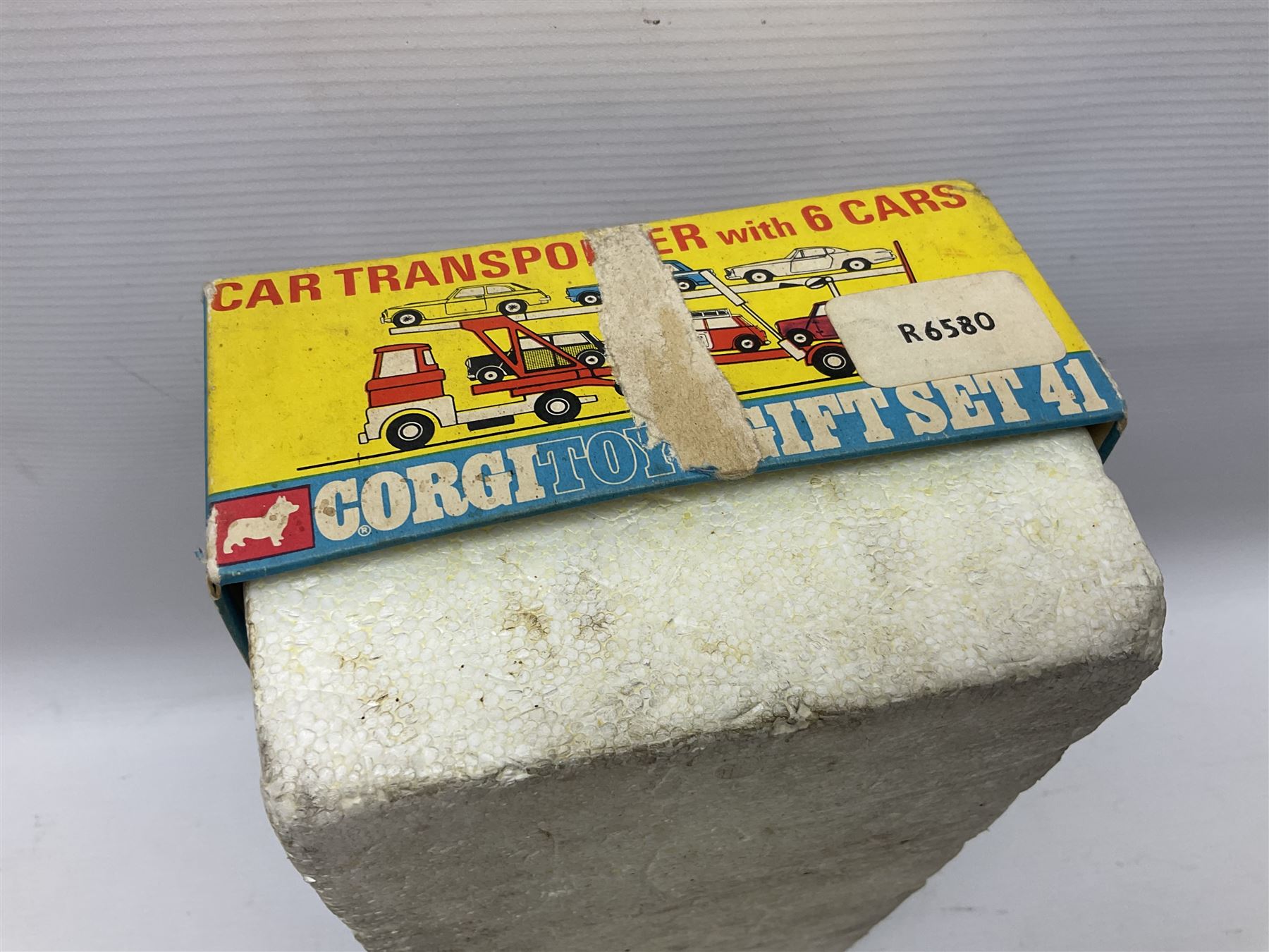 Corgi - Gift Set no.41 comprising Carrimore Mark Iv Transporter, Morris Mini-Cooper, BMC Mini-Cooper S, Morris Mini-Minor, Volvo P.1800 and Sunbeam IMP; missing MGC GT car; in original box 