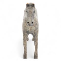 Carved Folk Art wooden horse, with glass eyes, H33cm