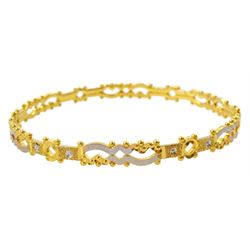  22ct gold pierced design bangle, with white gold highlights