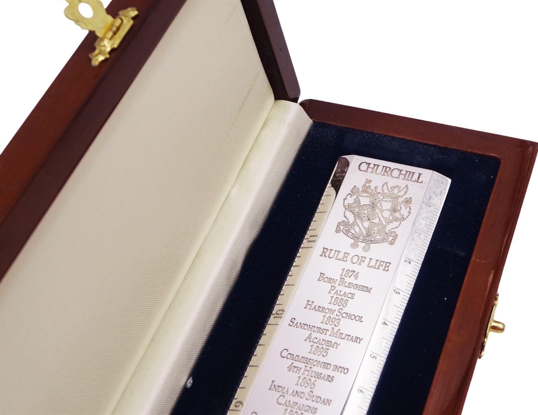 Modern silver 'Churchill Rule of Life' ruler, by Richard Jarvis of Pall Mall, engraved with the significant events and dates of Winston Churchill's life, from his birth in 1874 to his funeral in 1965, hallmarked Richard Jarvis, London 2007, L33.5cm, within wooden fitted case, with applied portrait to cover and silk and velvet lined interior