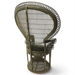 Mid-20th century wicker and rattan Peacock chair in unusual tones of dark olive and black, high fan back with a pieced and woven frame terminating to scrolled arms, with loose seat cushion