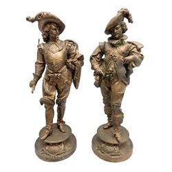 Pair of composite figures statues of the 17th century French adventurers Louis Vendome and Louis Conde standing on squat circular socles
