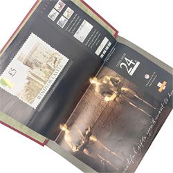 Royal Mail advertising cards, displaying upcoming commemorative issues, for use in post offices, housed in a single album