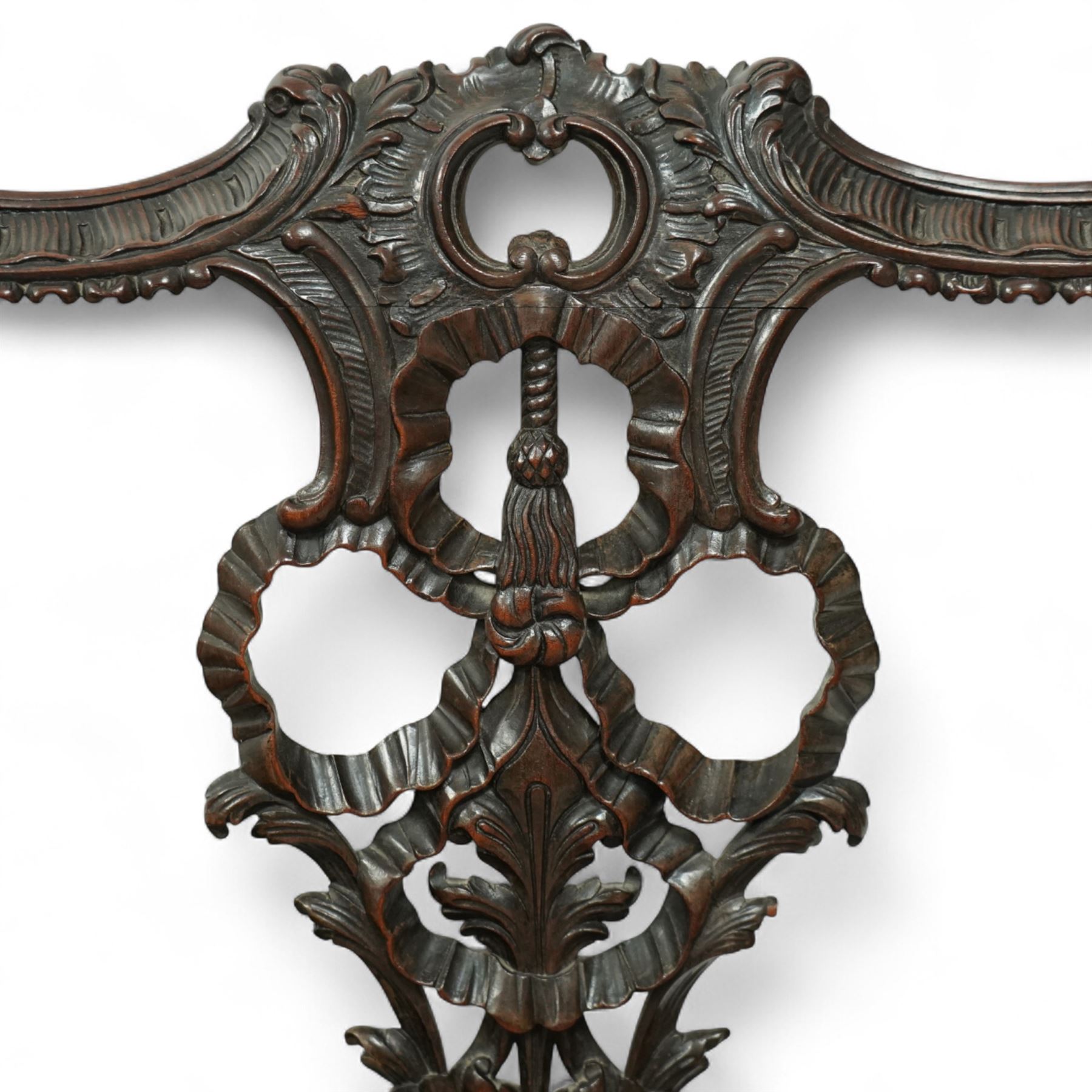 Set of eight 20th century Chippendale design mahogany dining chairs, including two carvers, each with pierced ribbon back splat carved with acanthus leaves, drop-in leather upholstered seats, moulded seat rails, on cabriole legs with ball and claw feet