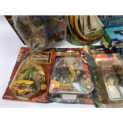 Assorted action figures - five Pirates of the Caribbean; five Indiana Jones; one Lord of the Rings; one Psycho; and four Harry Potter; all in unopened blister packs; together with a Harry Potter die-cast model of Mr. Weasley's Ford Anglia, boxed (17)