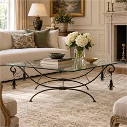 In the manner of Maison Jansen - Regency inspired glass and wrought metal coffee table wit...