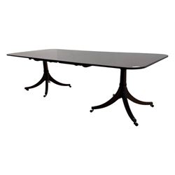 Regency design mahogany twin pillar dining table, two additional leaves, on turned supports with four out-splayed supports 